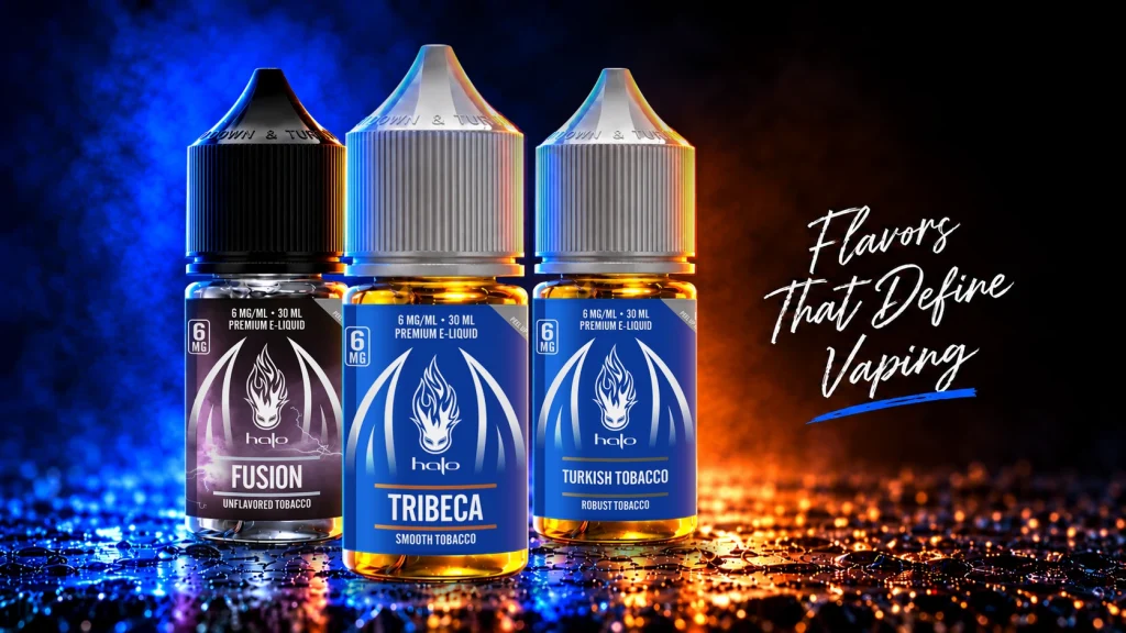 Halo Fusion, Tribeca and Turkish Tobacco bottles with blue and orange lighting - Flavors That Define Vaping.